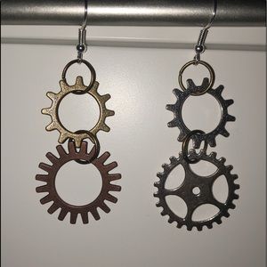 A pair of gear earrings.